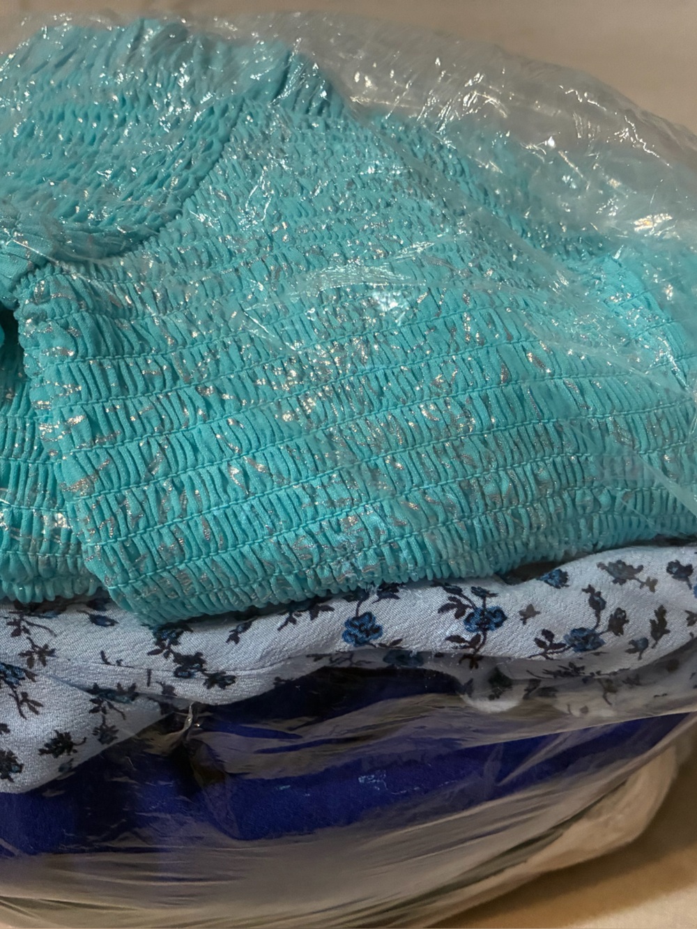 Bag of New and NWT Dresses in Different Sizes.